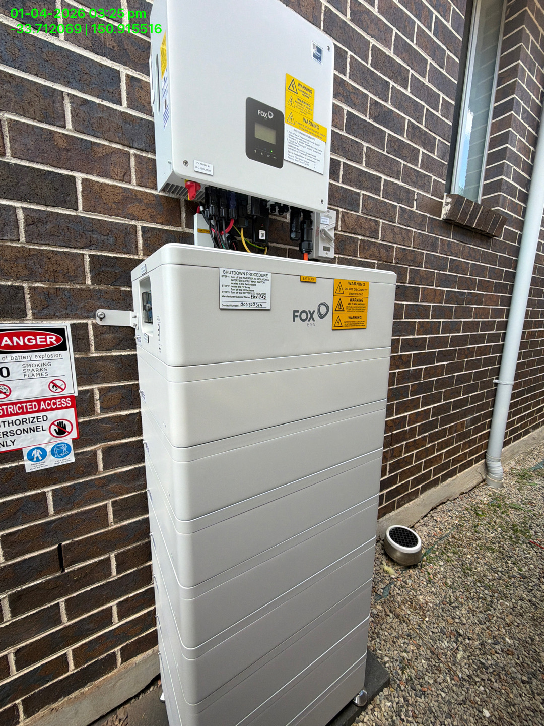 Growatt home battery system installed against a brick wall meeting AS/NZS 5139 clearance requirements